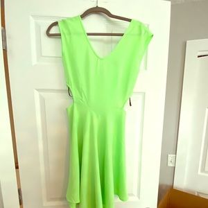 Bright green a-line dress with side cut-outs
